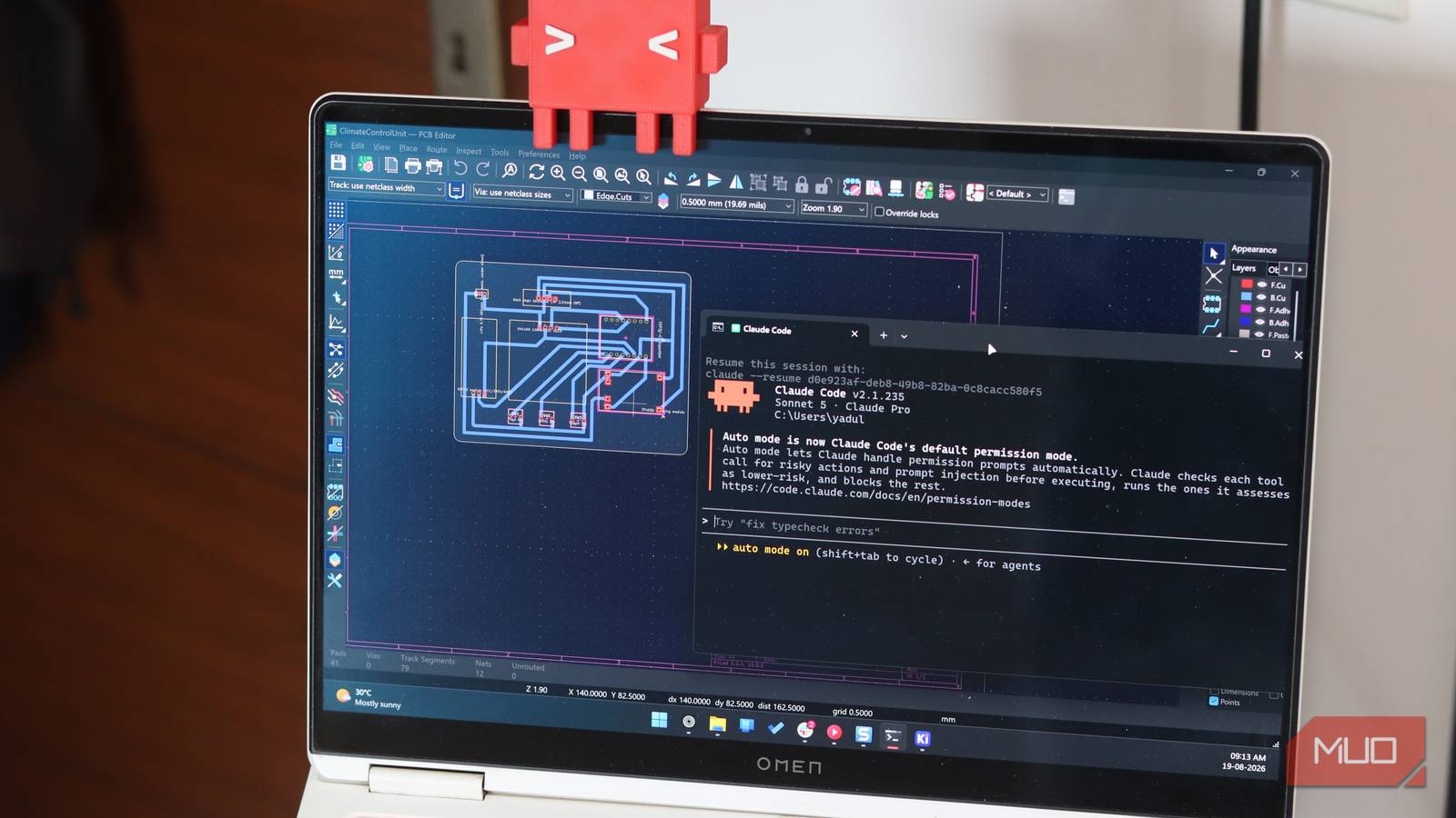 Claude Code terminal showing KiCad MCP server generating PCB layout