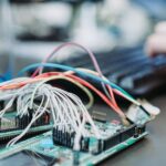 Electronic circuit board showing ESP32 microcontroller for edge AI and local LLM processing without cloud dependency