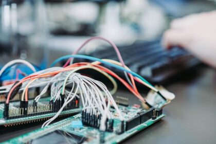 Electronic circuit board showing ESP32 microcontroller for edge AI and local LLM processing without cloud dependency