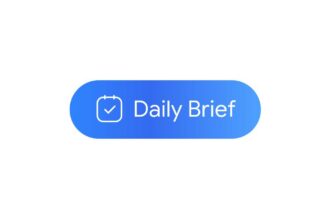 Phone showing a morning summary screen of tasks and emails at sunrise