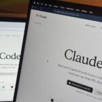 Claude Code open on a MacBook and iPad during a research session