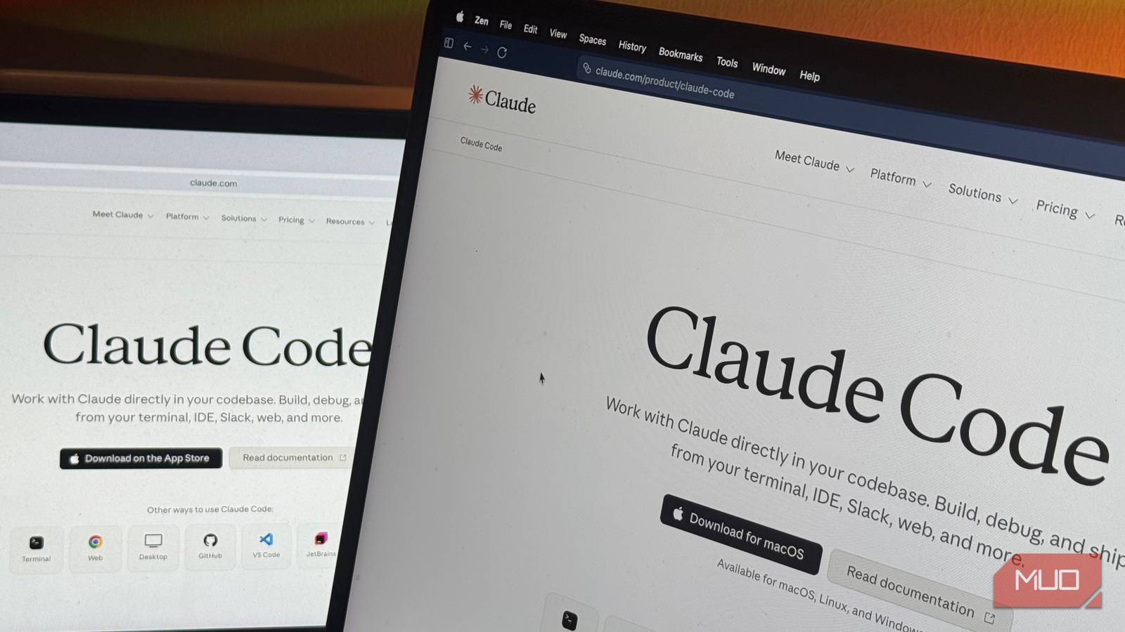 Claude Code open on a MacBook and iPad during a research session
