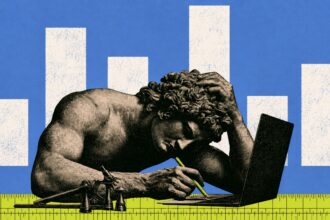 Notebook with handwritten test scores beside a laptop running an AI chatbot