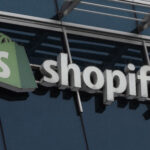 online shopper paying on a laptop with a digital shopping cart interface