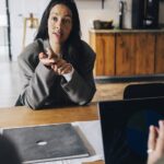 Job candidate negotiating salary in an interview, reflecting the AI skills pay premium