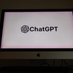 OpenAI and ChatGPT branding shown on a screen