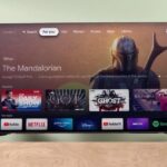Google TV home screen showing rows of streaming apps on a smart television