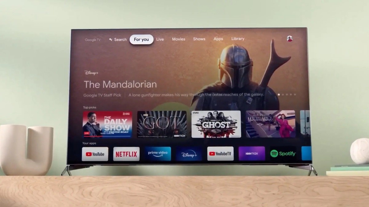 Google TV home screen showing rows of streaming apps on a smart television