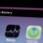 iPhone showing a low battery warning while charging