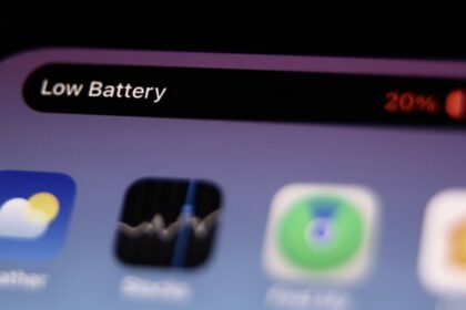 iPhone showing a low battery warning while charging