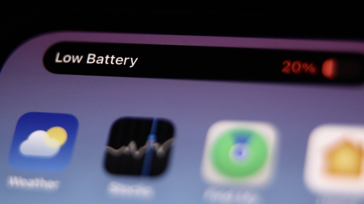 iPhone showing a low battery warning while charging
