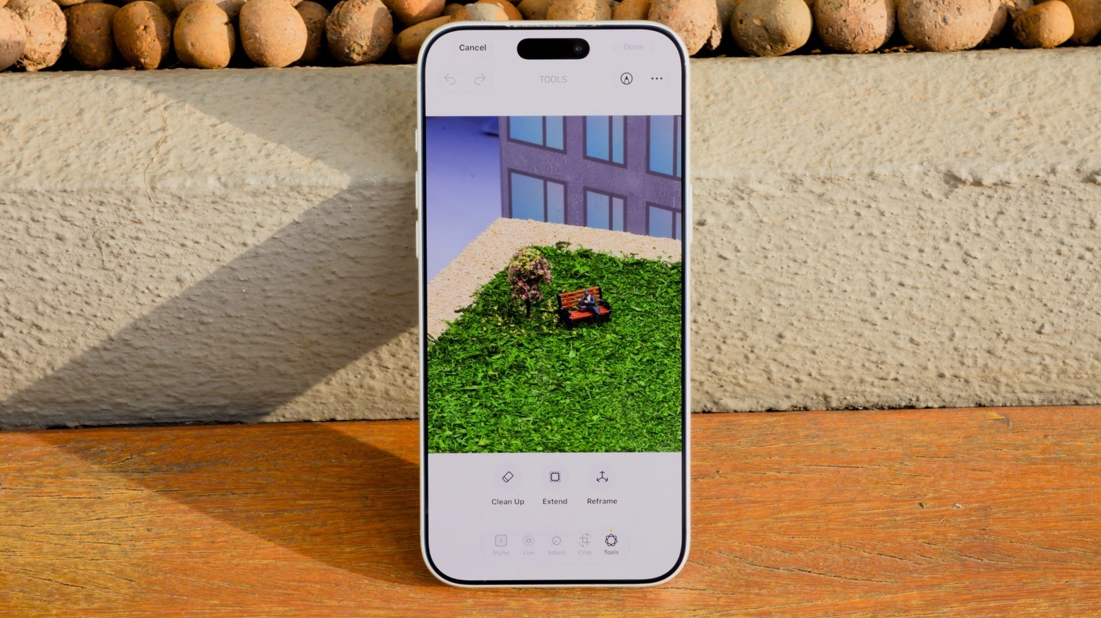 iPhone screen showing a photo being edited with an object removed
