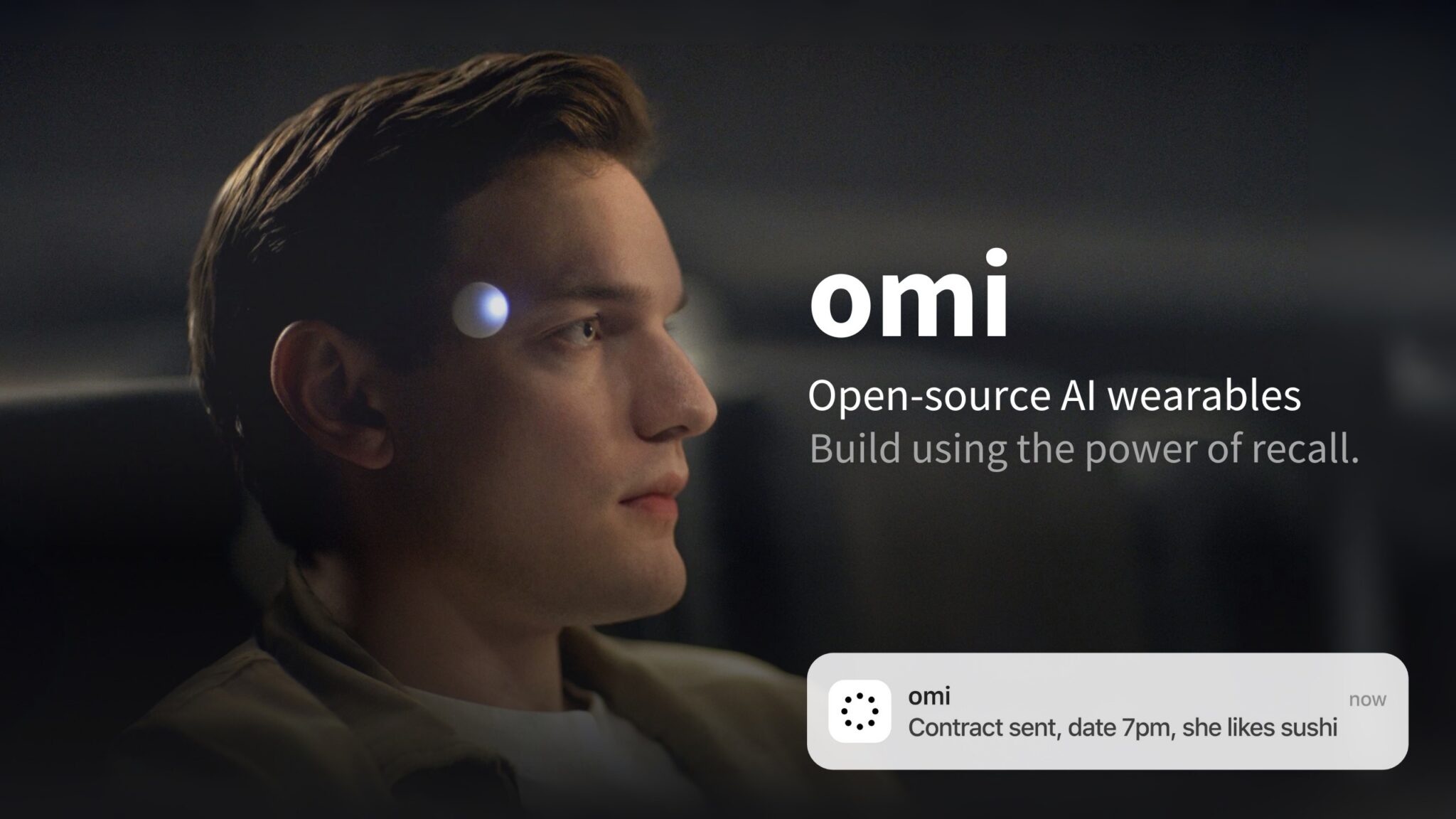 Omi AI wearable pendant device on a dark background