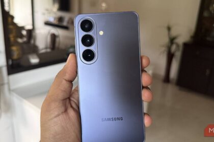 Hand holding a Samsung Galaxy S26 phone showing its notification panel