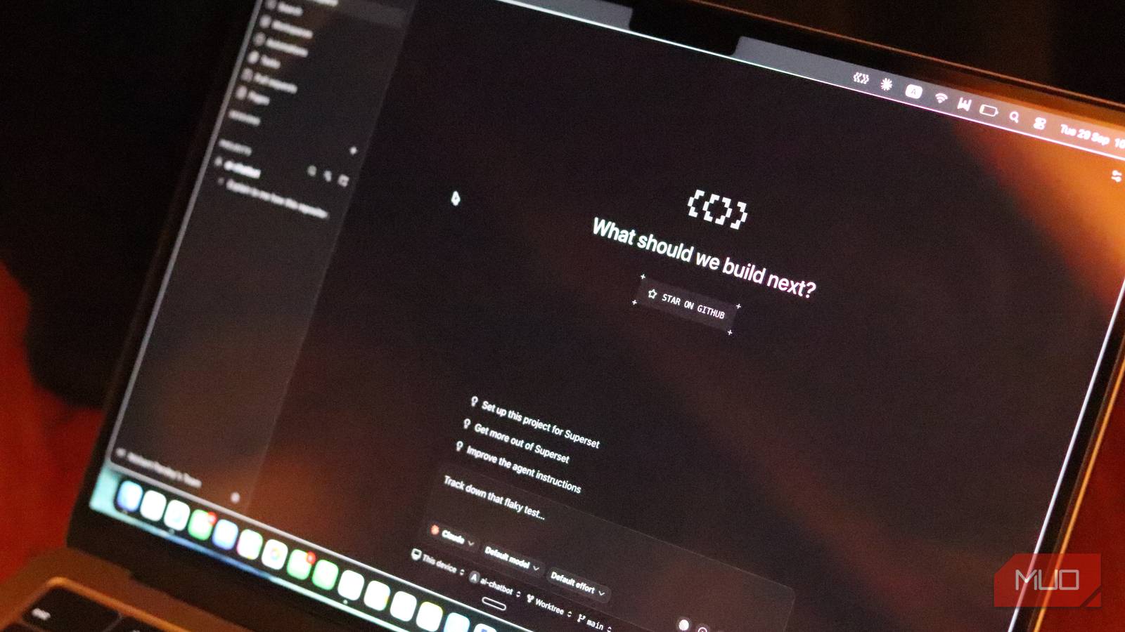 Superset IDE running multiple agent workspaces side by side on a laptop